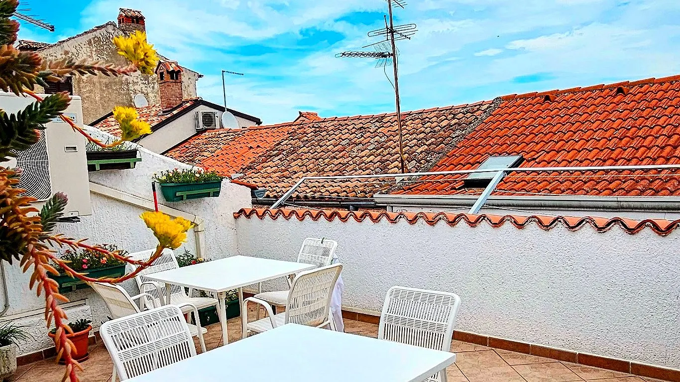 Shared terrace with table and chairs